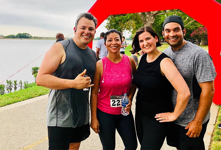 Four team members at fundraiser run event