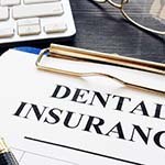 Dental insurance paperwork for the cost of dental emergencies in Carrollton 