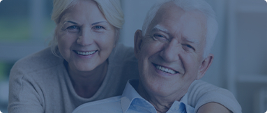 Senior man and woman smiling together