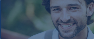 Young man smiling outdoors