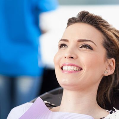 woman smiling in dental chair 
