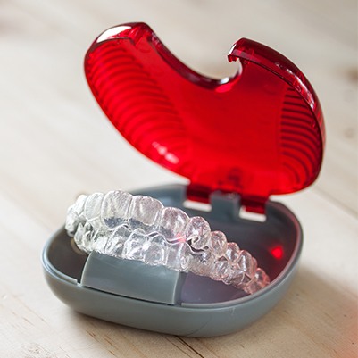 Set of Invisalign trays in carrying case
