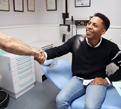man shaking hands with his cosmetic dentist in Frisco