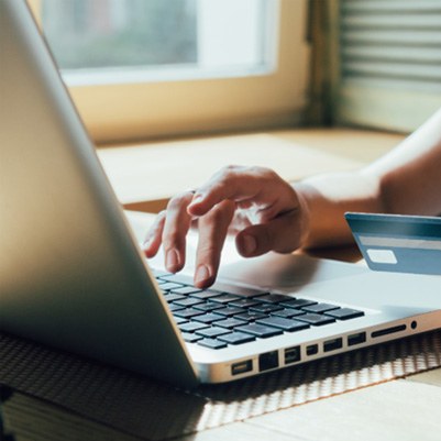 Woman holding a credit card