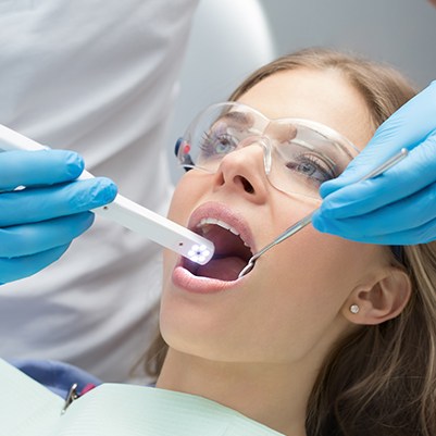 Dentist capturing intraoral images