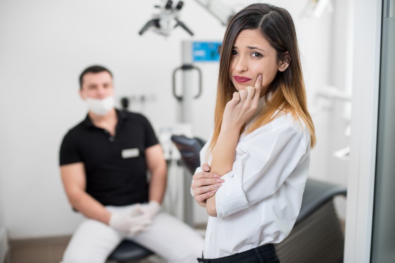 a woman waiting to undergo root canal therapy