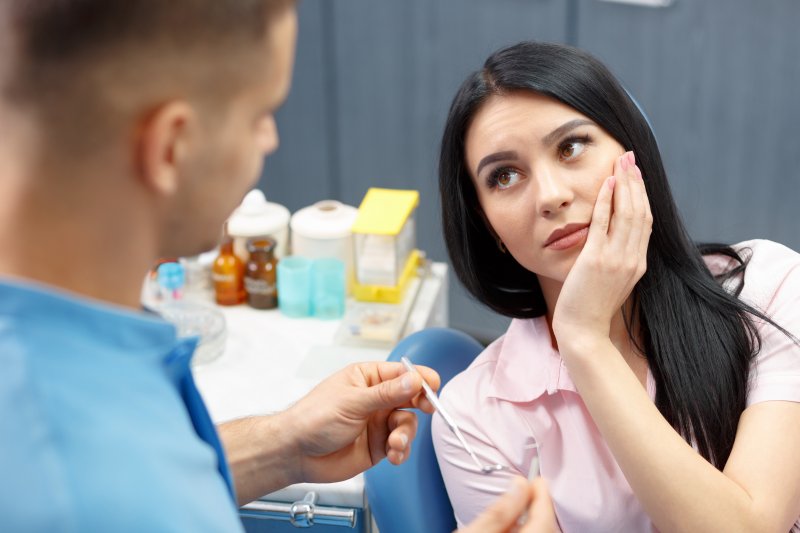 A closeup of a woman about to receive root canal therapy